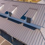 What Happens to the Old Roof: Tear-Off Waste and Disposal Costs on a Commercial Reroof Superior Roofing Ltd.
