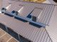 What Happens to the Old Roof: Tear-Off Waste and Disposal Costs on a Commercial Reroof Superior Roofing Ltd.